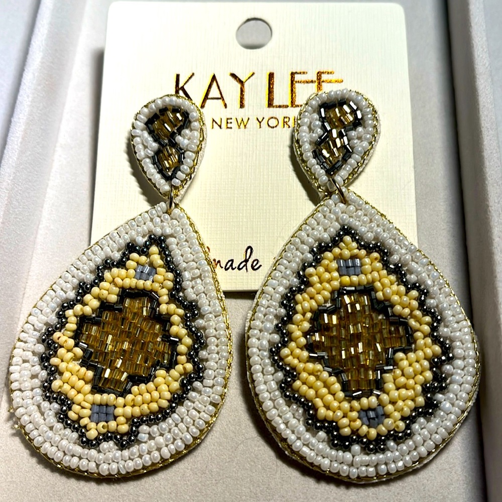 NWT!!! Gorgeous white, gold, silver, and ivory beaded chandelier earrings!